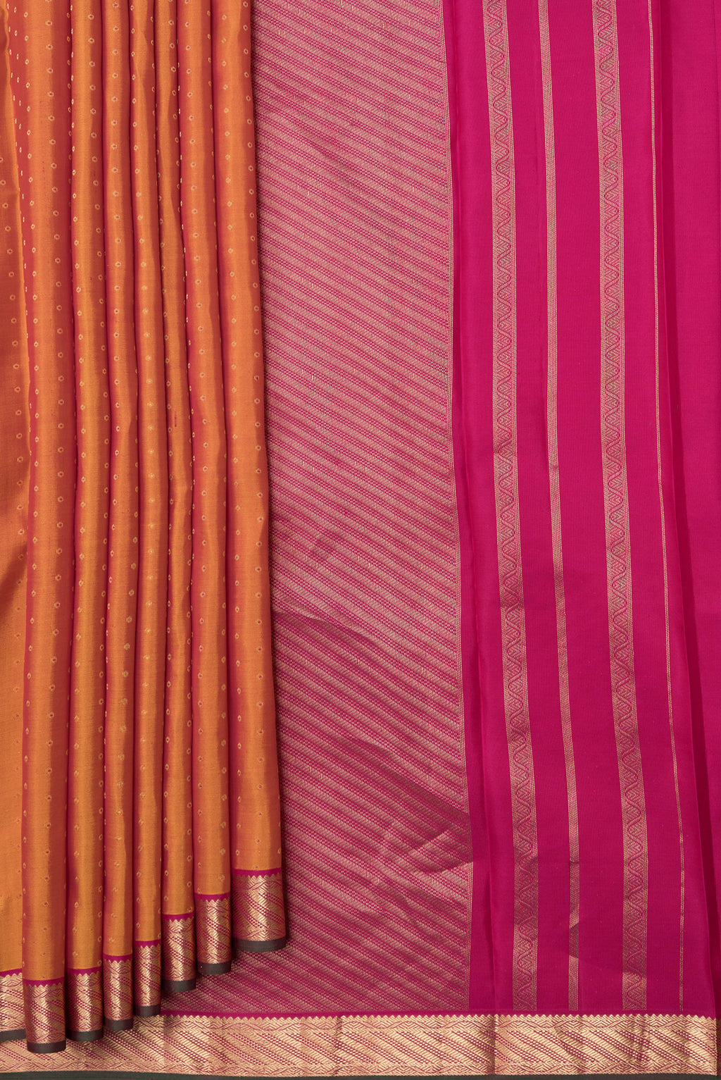 Pleats and pallu of Mustard Dual Tone Kanchipuram Silk Saree with Zari Butta on the body and Zari Border. 