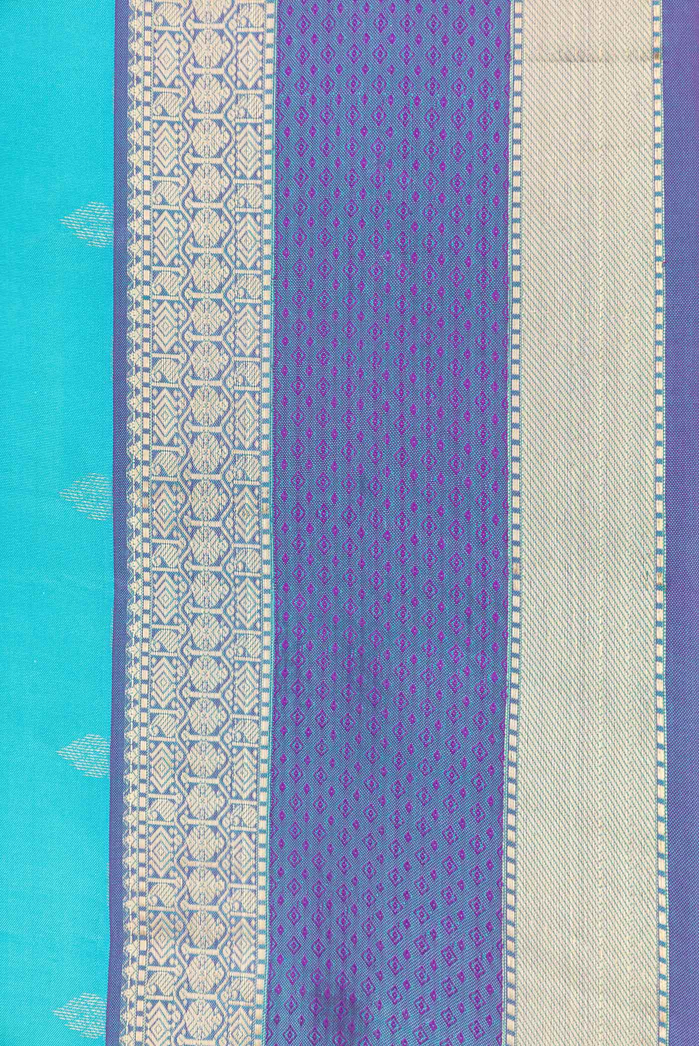 Border image of Sky Blue Dual Tone Kanchipuram Silk Saree with Zari Butta on the body and Zari And Thread Border. 