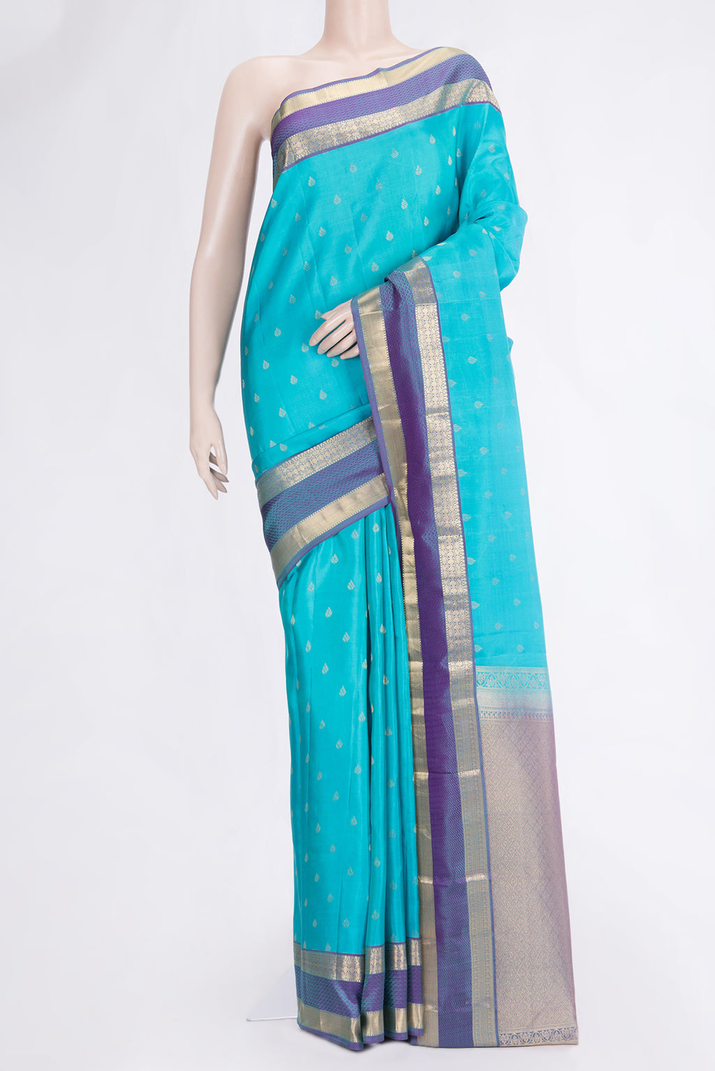 Sky Blue Dual Tone Kanchipuram Silk Saree with Zari Butta on the body and Zari And Thread Border.  displayed on a mannequin