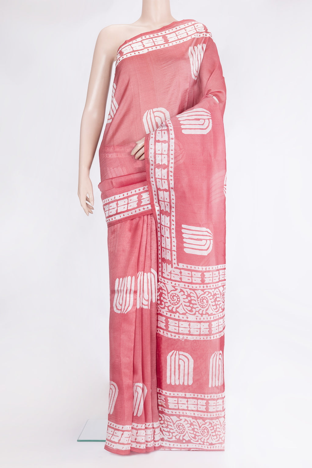 Pink Tussar Silk Saree with Printed design on the body and Printed Border.  displayed on a mannequin