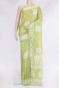 Pista Green Tussar Silk Saree with Printed design on the body and Printed Border.  displayed on a mannequin