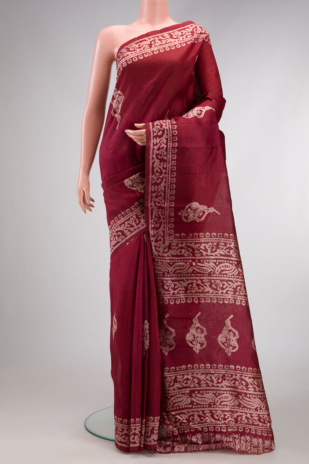 Coffee Brown Dual Tone Tussar Silk Saree with Printed design on the body and Fancy Border.  displayed on a mannequin
