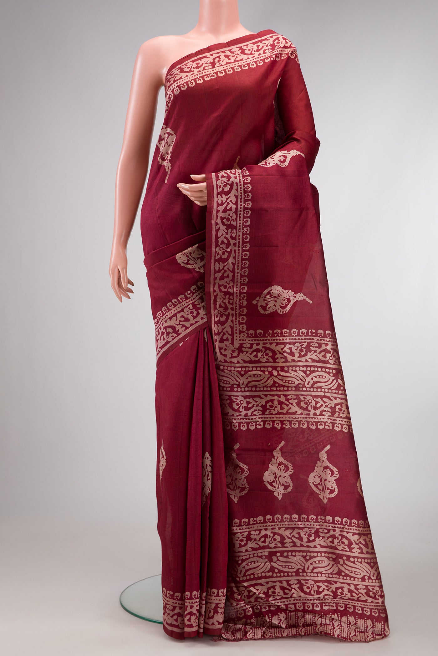 Coffee Brown Dual Tone Tussar Silk Saree with Printed design on the body and Fancy Border.  displayed on a mannequin