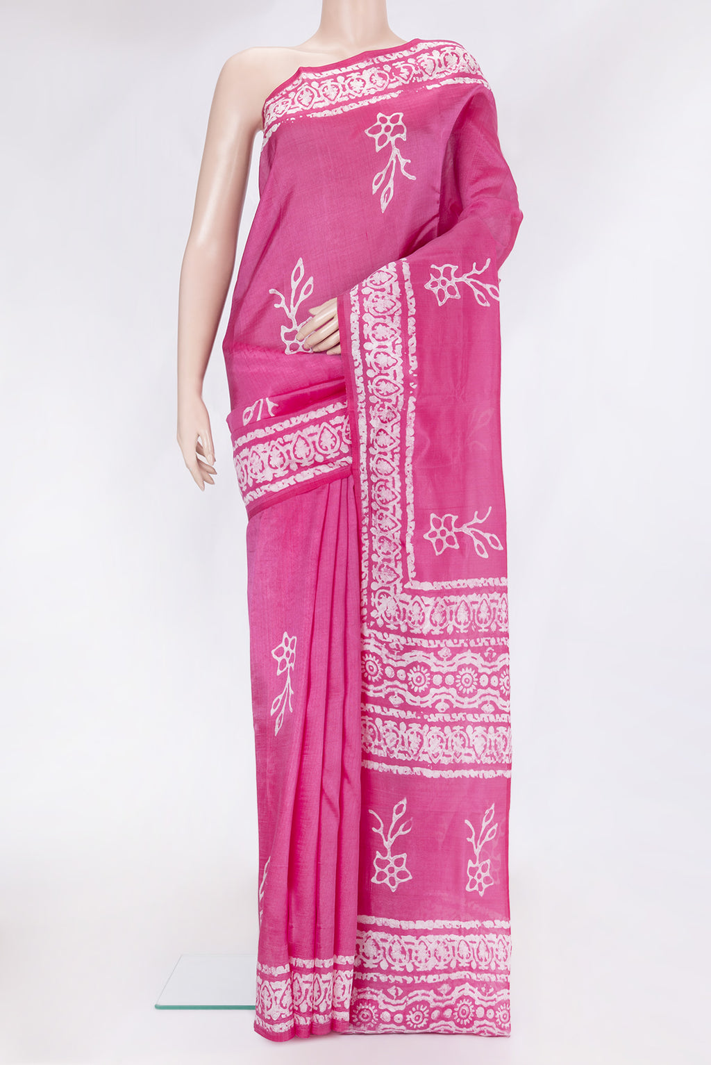 Rose pink Dual Tone Tussar Silk Saree with Batik Print on the body and Printed Border.  displayed on a mannequin
