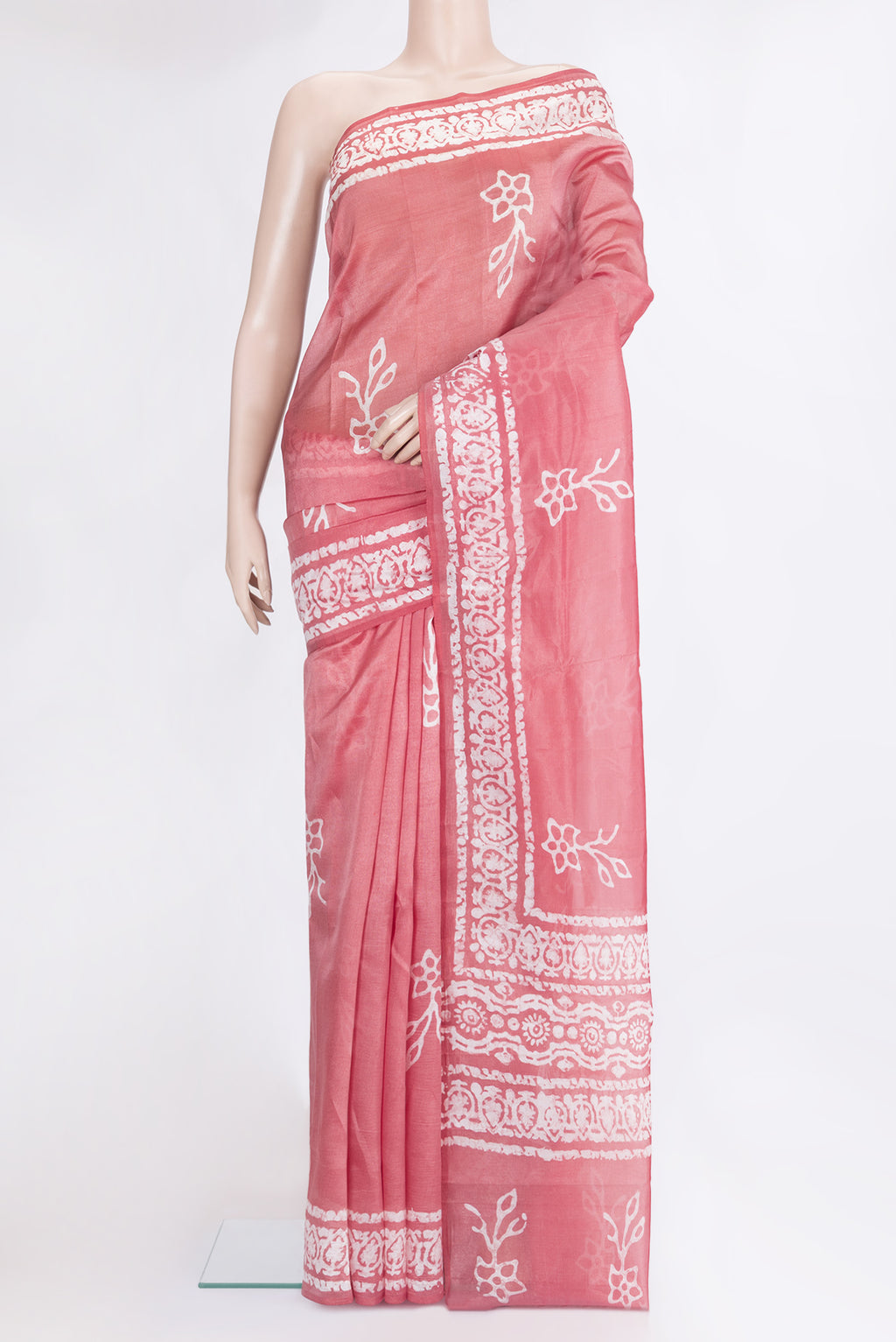 Pink Tussar Silk Saree with Printed design on the body and Printed Border.  displayed on a mannequin