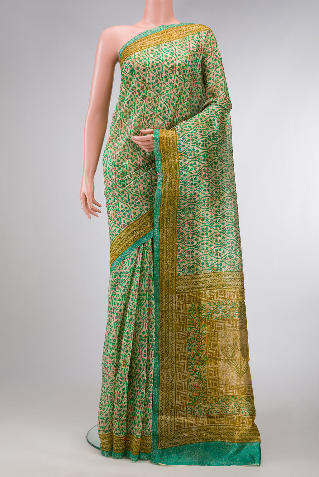 Beige Dual Tone Tussar Silk Saree with Printed design on the body and Printed Border.  displayed on a mannequin