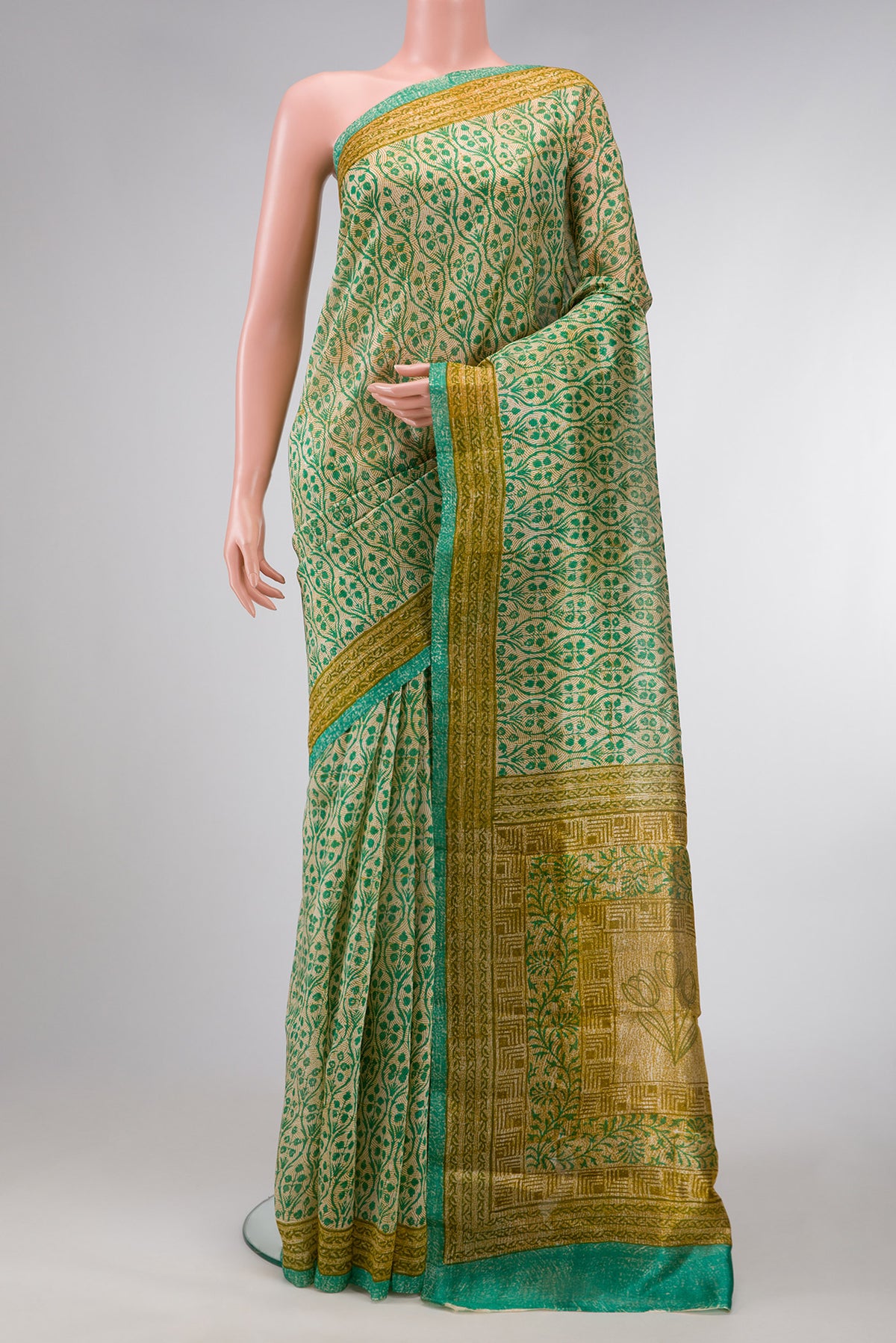 Beige Dual Tone Tussar Silk Saree with Printed design on the body and Printed Border.  displayed on a mannequin
