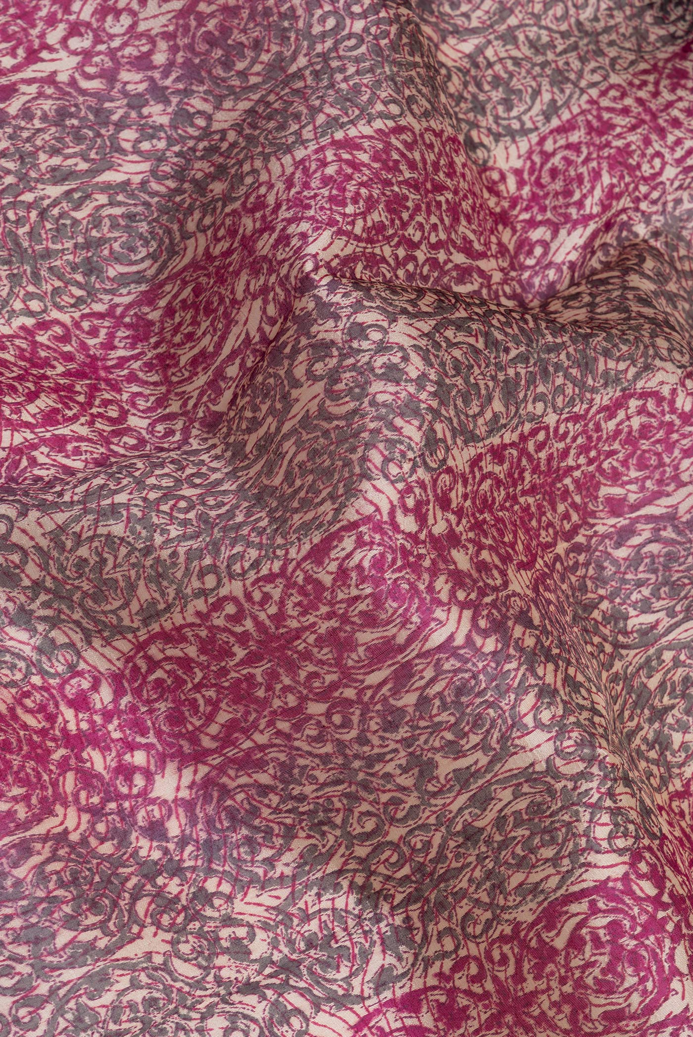 Close up of Multi Color Tussar Silk Saree with Printed design on the body and Printed Border.  displaying folds