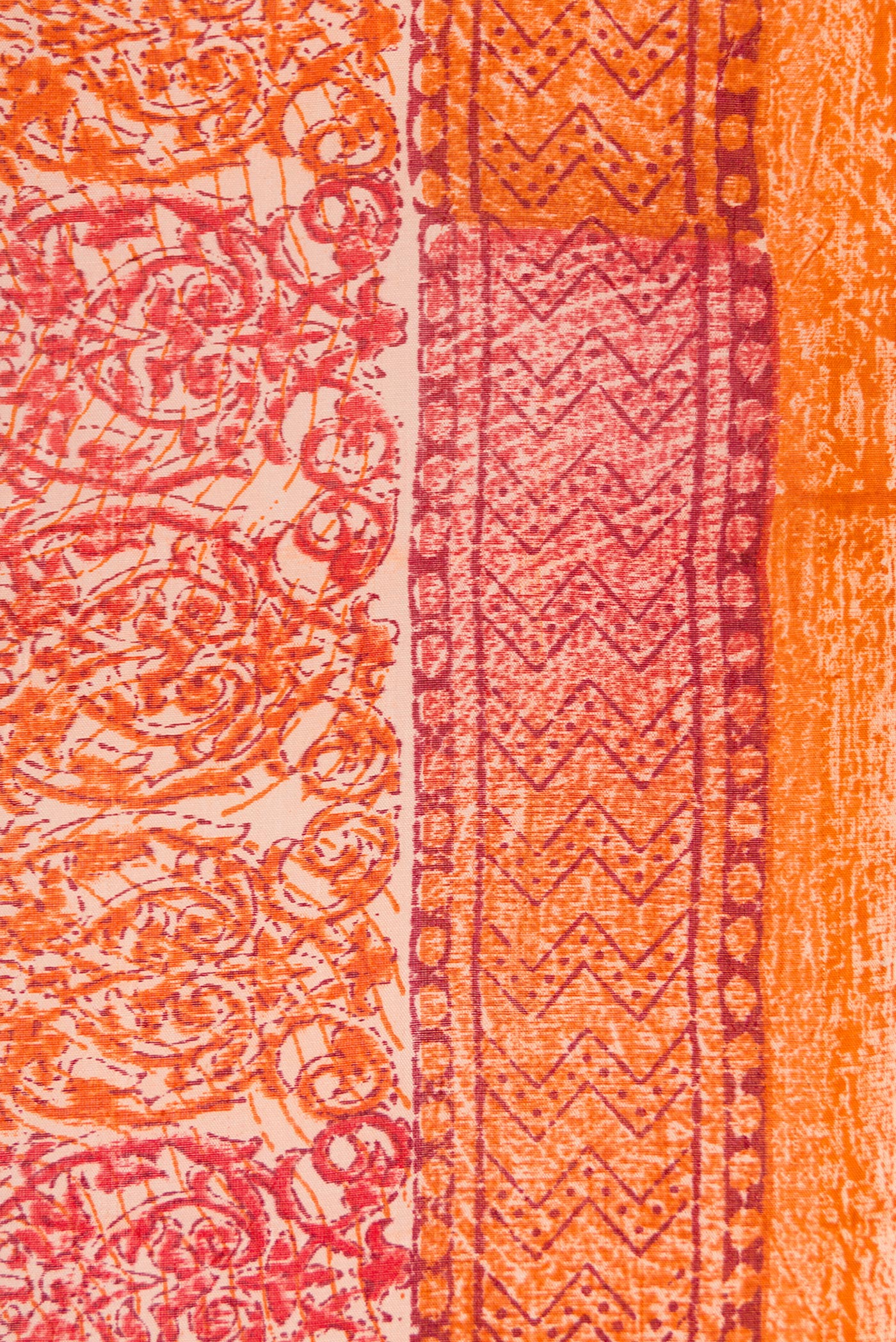 Border image of Orange Dual Tone Tussar Silk Saree with Printed design on the body and Printed Border. 