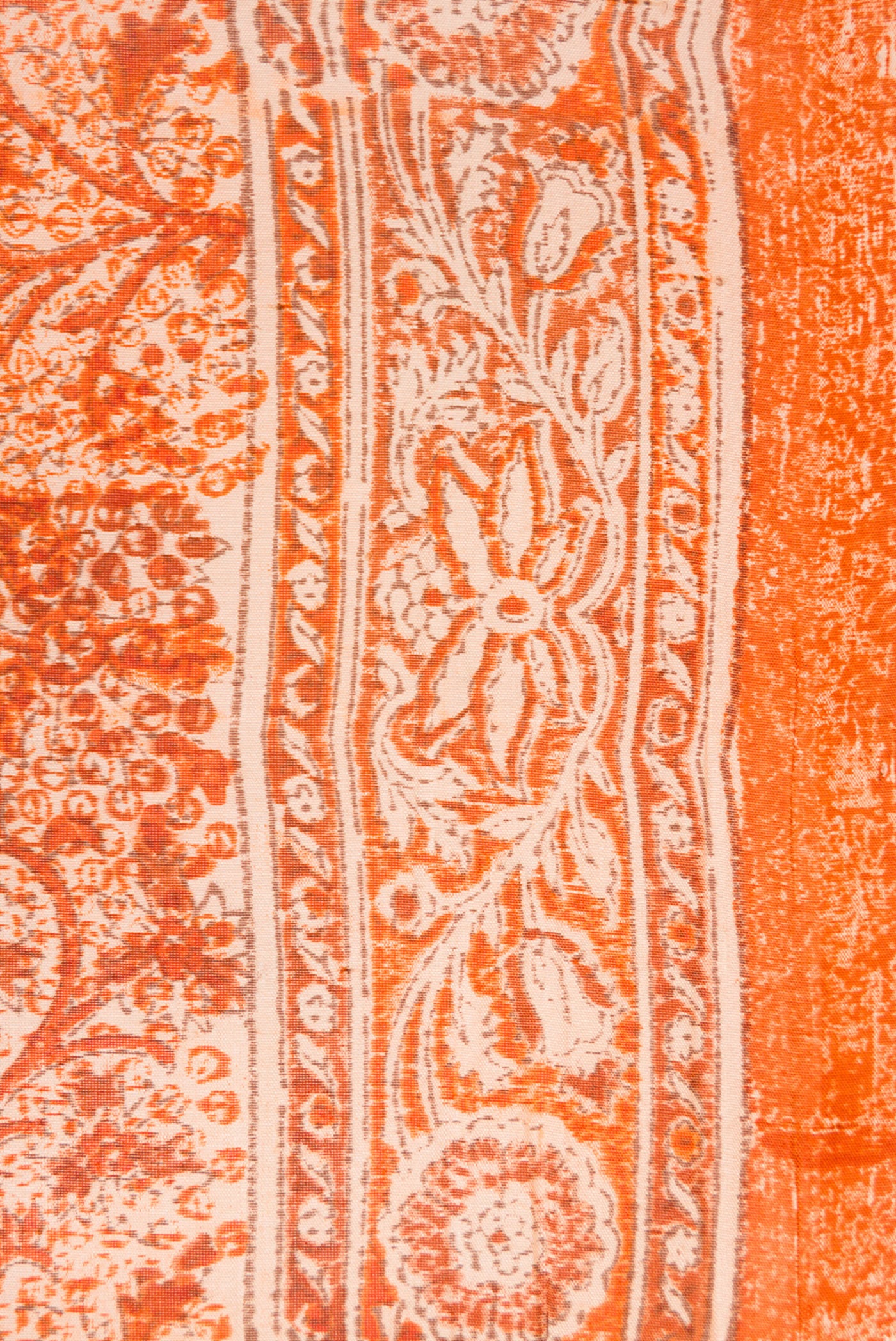 Border image of Orange Dual Tone Tussar Silk Saree with Printed design on the body and Printed Border. 