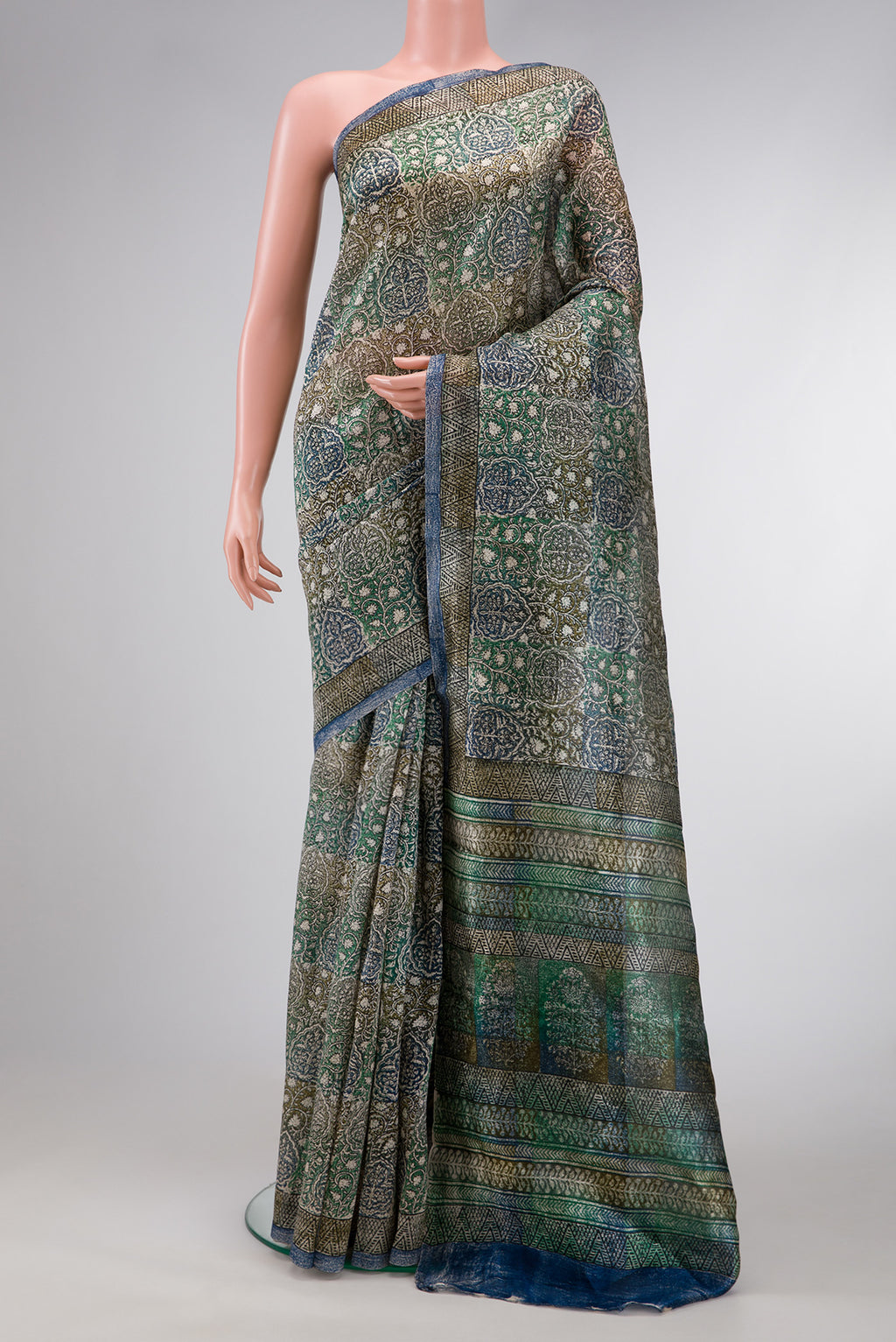 Grey Dual Tone Tussar Silk Saree with Printed design on the body and Printed Border.  displayed on a mannequin