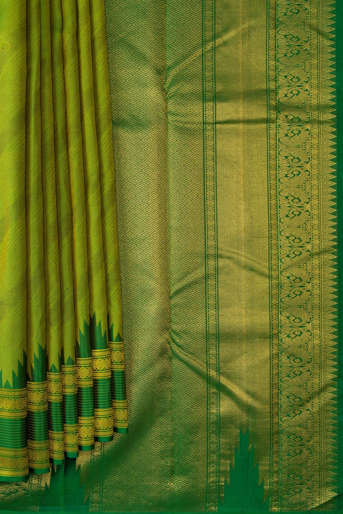 Pleats and pallu of Pista Green Dual Tone Kanchipuram Silk Saree with Jacquard design on the body and Temple Border. 