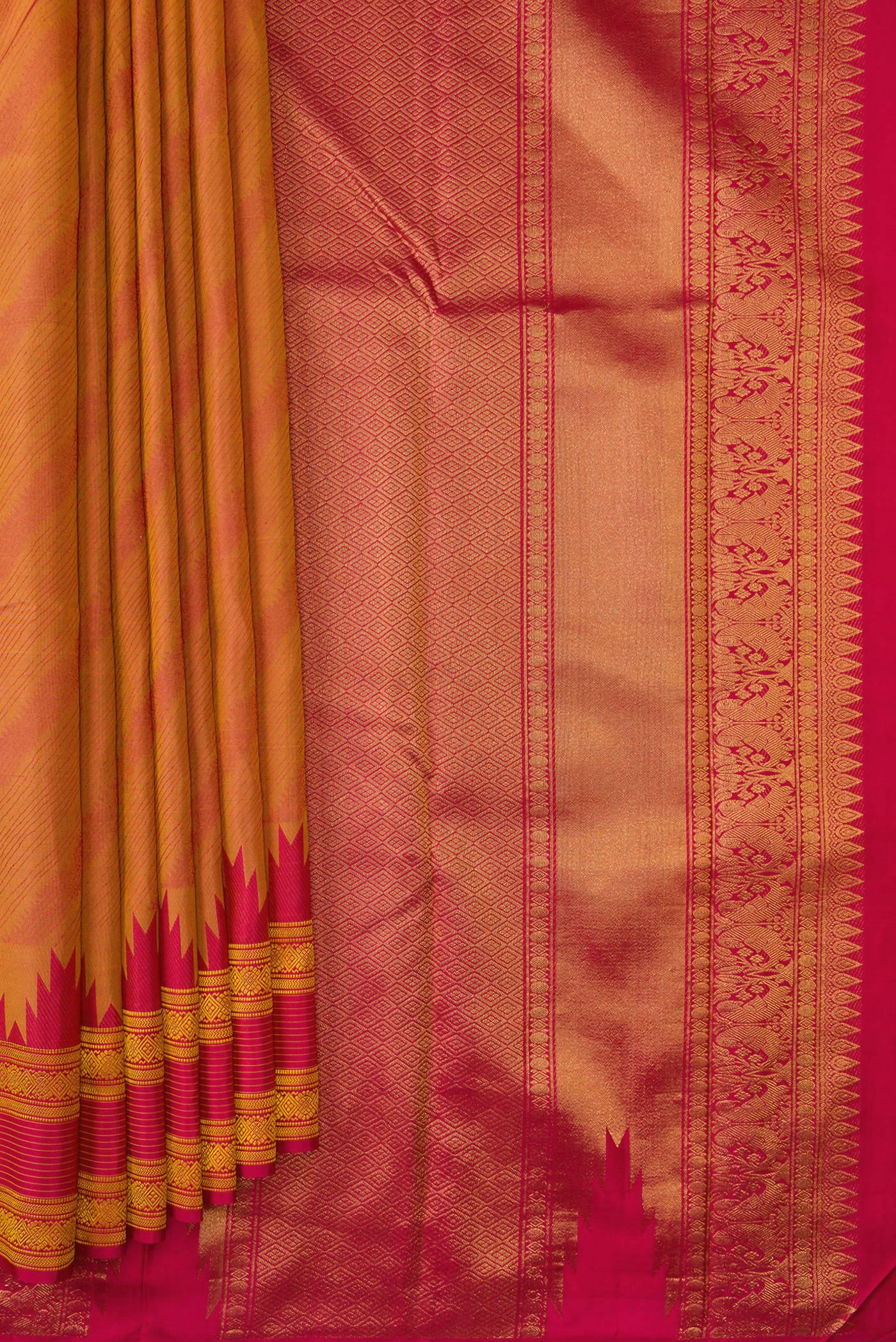 Pleats and pallu of Mustard Dual Tone Kanchipuram Silk Saree with Jacquard design on the body and Temple Border. 