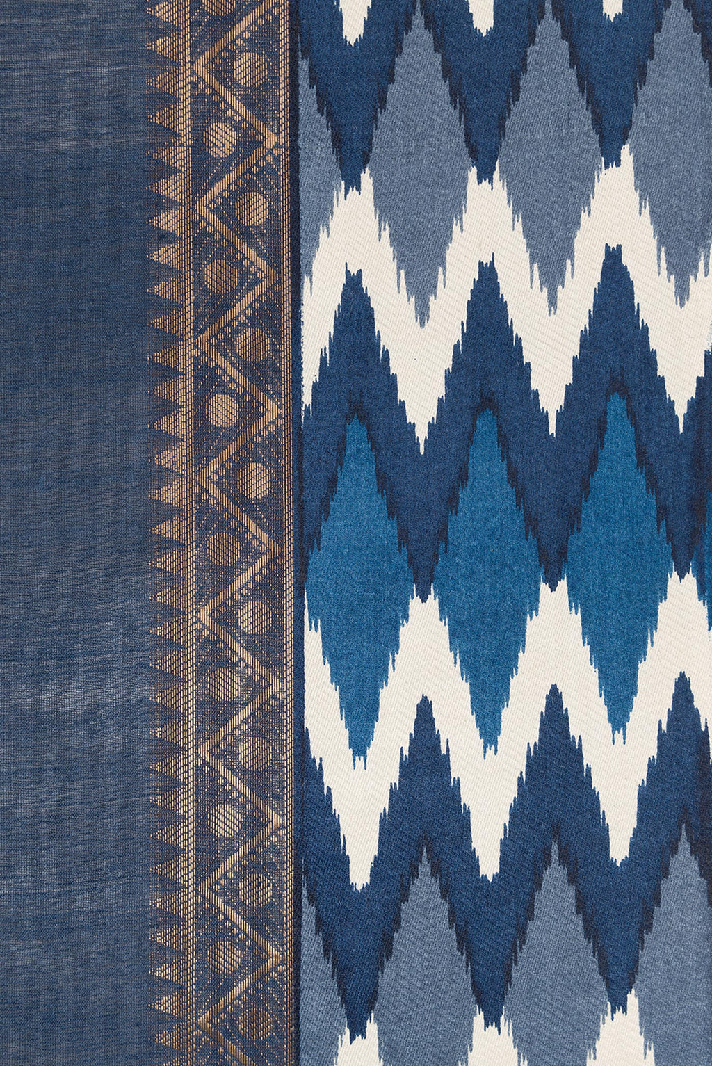 Border image of Navy Blue Dual Tone Tussar Silk Saree with Zari Butta on the body and Ikat Border. 