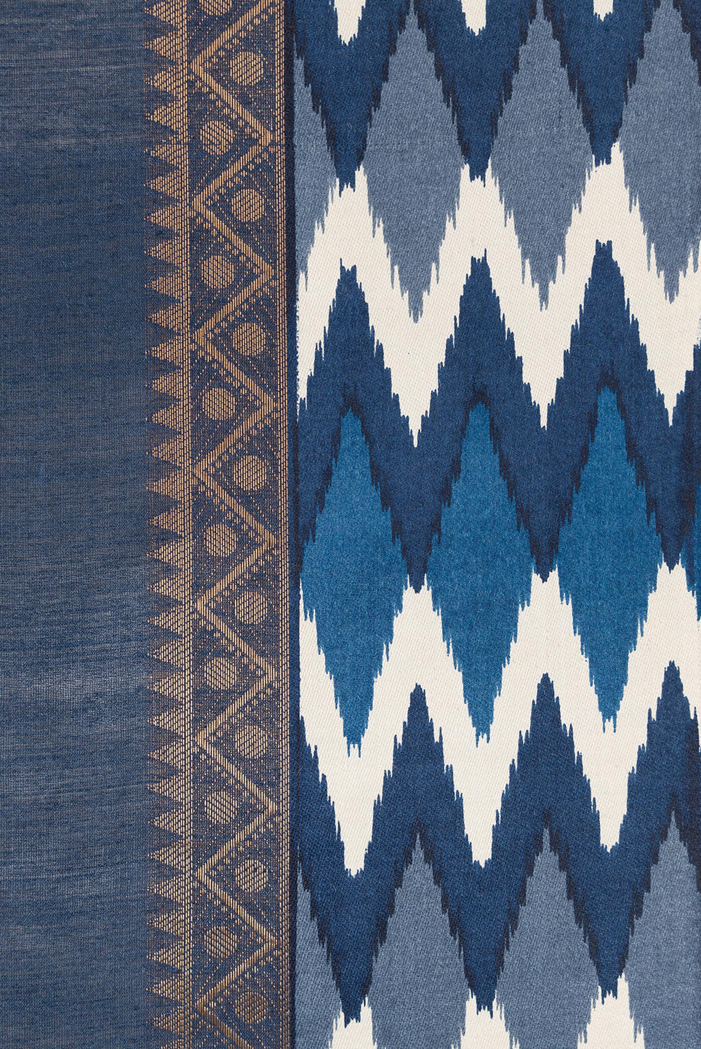 Border image of Navy Blue Dual Tone Tussar Silk Saree with Zari Butta on the body and Ikat Border. 