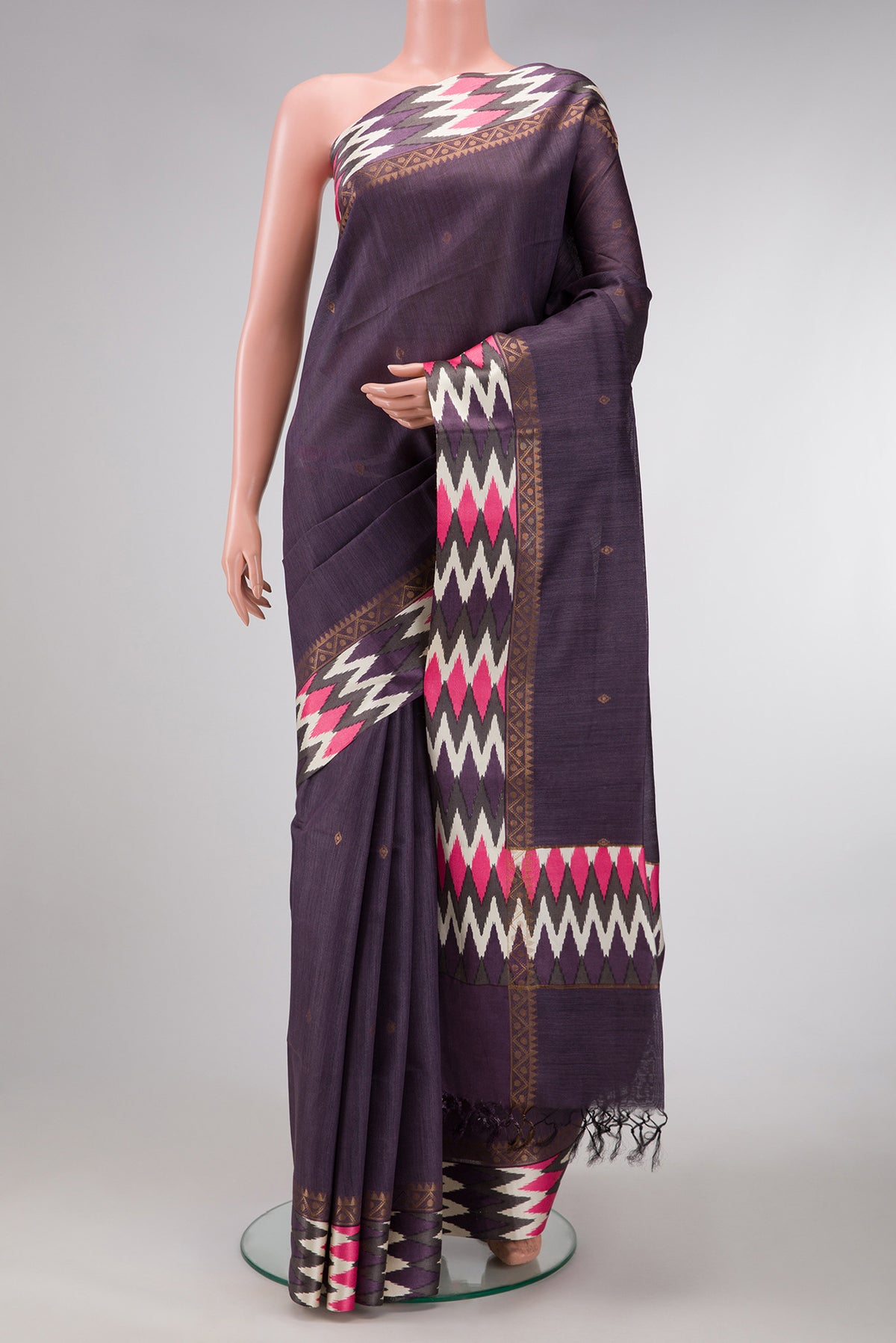 Violet Dual Tone Tussar Silk Saree with Zari Butta on the body and Ikat Border.  displayed on a mannequin