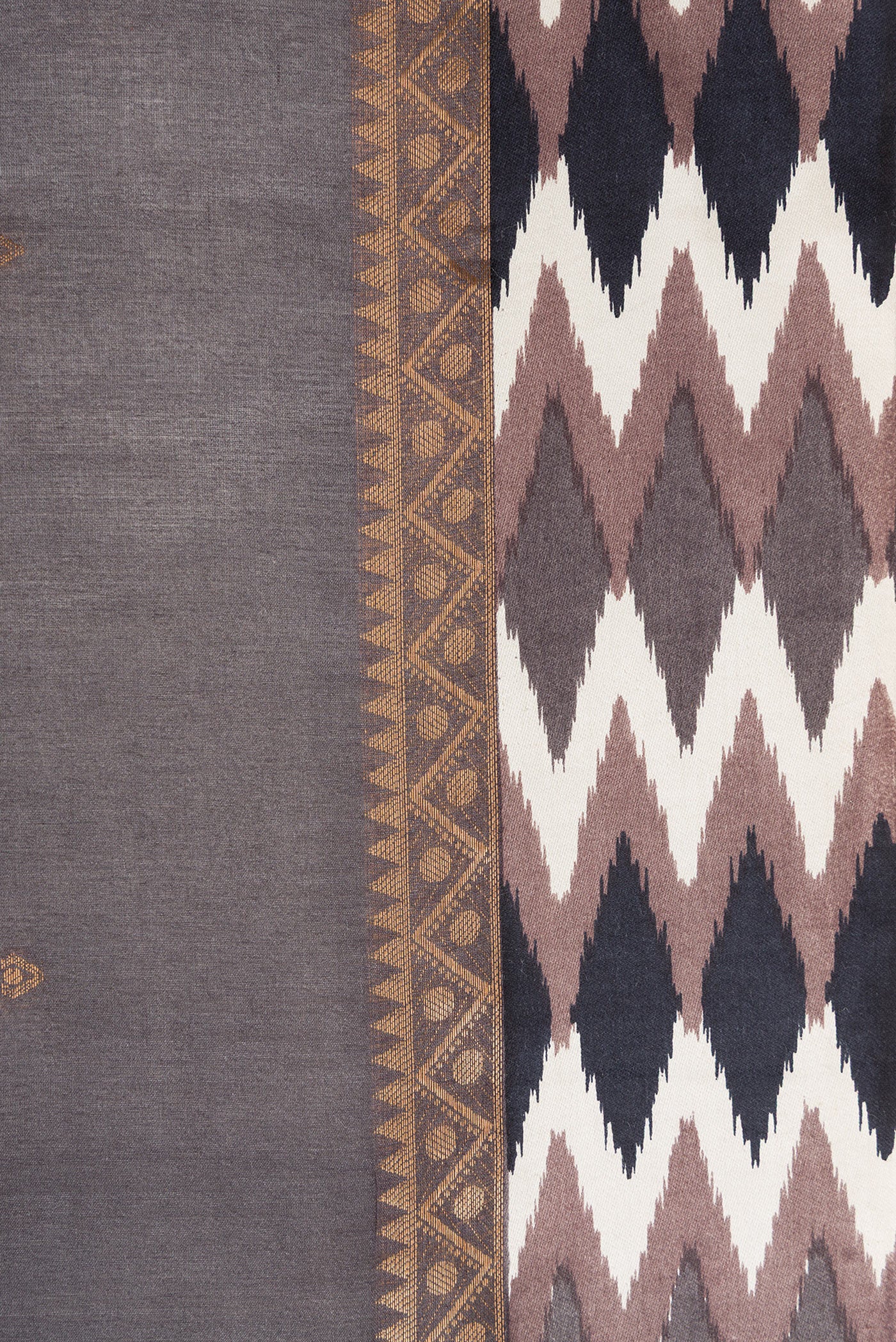 Border image of Grey Dual Tone Tussar Silk Saree with Zari Butta on the body and Ikat Border. 