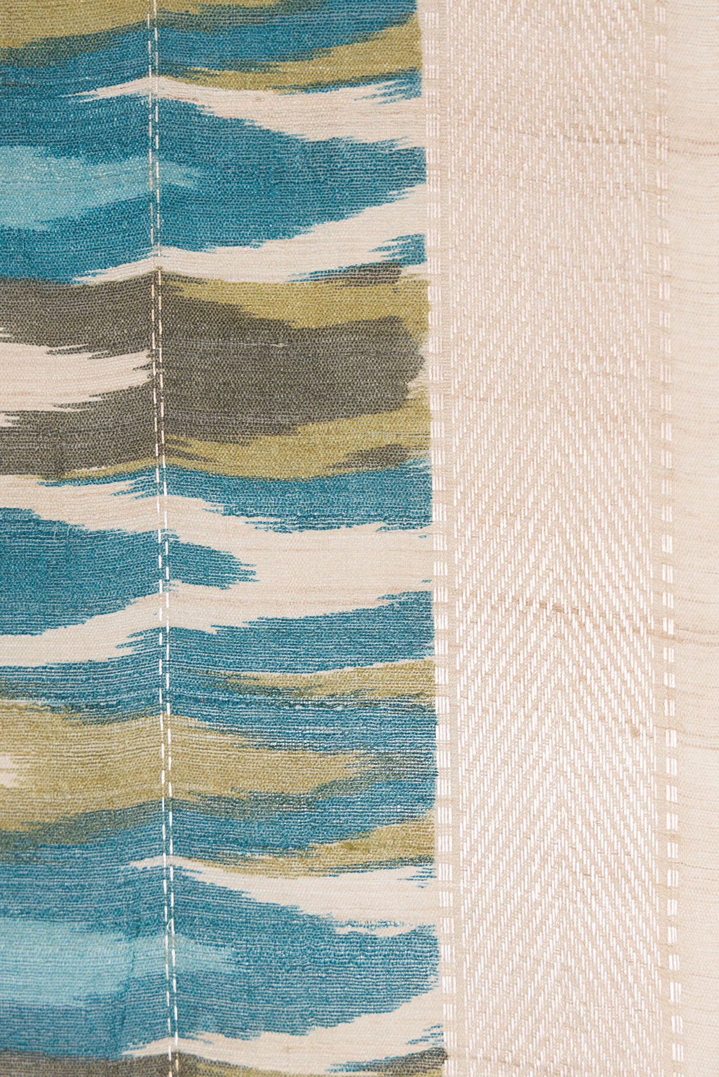 Border image of Sky Blue and Mehandi Green Color Tussar Silk Saree with Ikat Print on the body and Zari Border. 