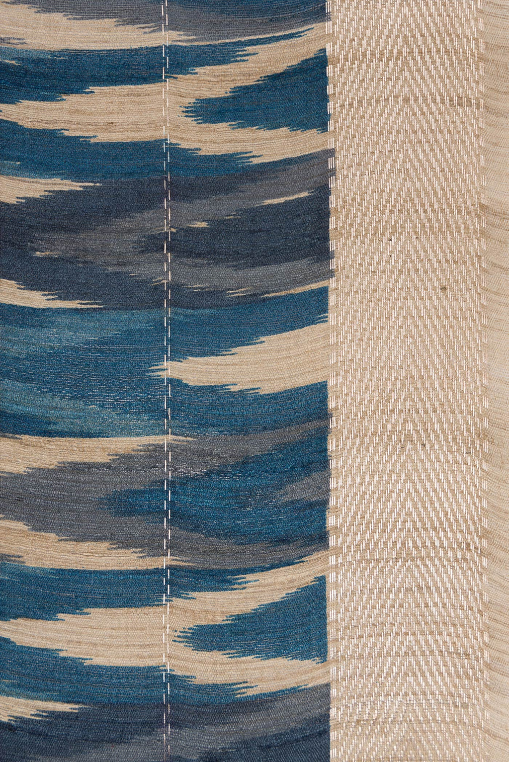 Border image of Peacock Blue and Beige Color Tussar Silk Saree with Ikat Print on the body and Zari Border. 