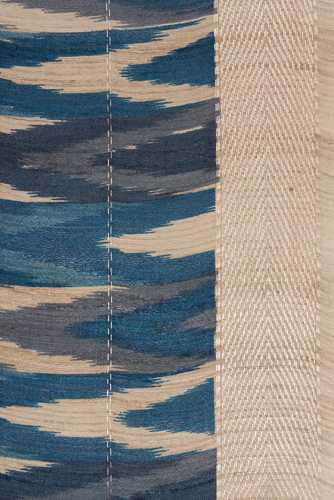 Border image of Peacock Blue and Beige Color Tussar Silk Saree with Ikat Print on the body and Zari Border. 