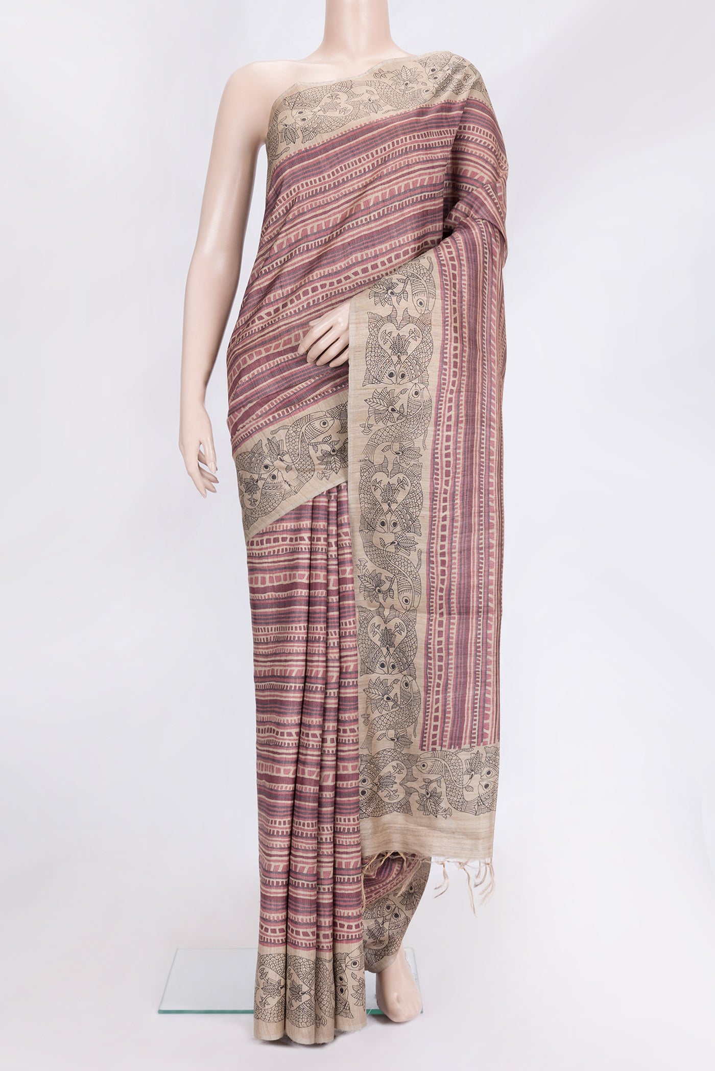 Beige Dual Tone Tussar Silk Saree with Printed design on the body and Printed Border.  displayed on a mannequin