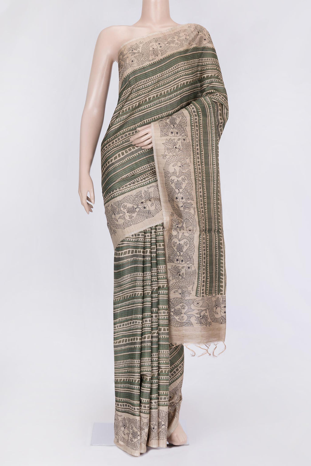 Green Dual Tone Tussar Silk Saree with Printed design on the body and Fancy Border.  displayed on a mannequin
