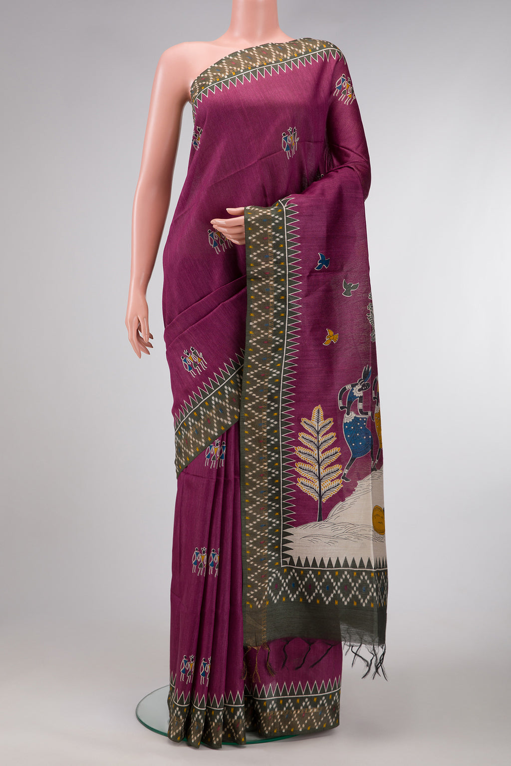 Burgundy Dual Tone Tussar Silk Saree with Printed design on the body and Ikat Border.  displayed on a mannequin