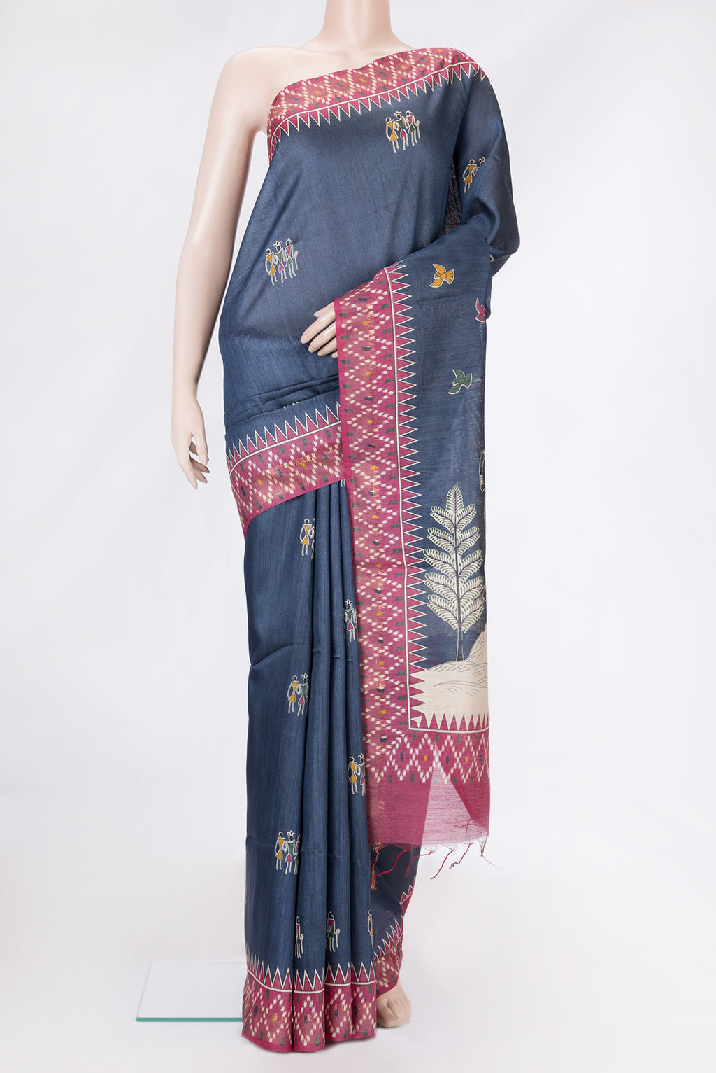 Navy Blue Dual Tone Tussar Silk Saree with Printed design on the body and Ikat Border.  displayed on a mannequin
