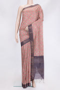Magenta Dual Tone Tussar Silk Saree with Printed design on the body and Zari Border.  displayed on a mannequin