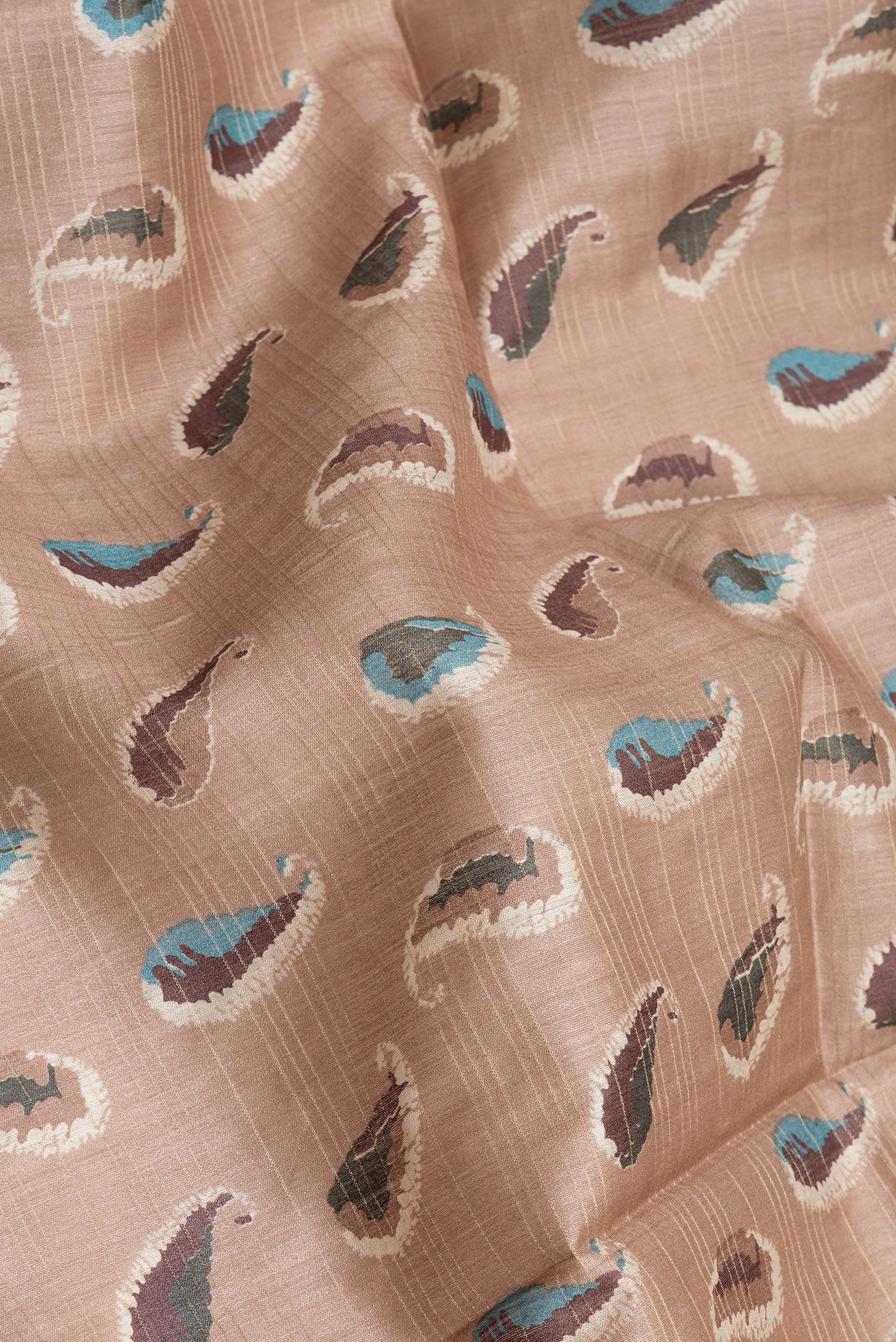Close up of Beige Tussar Silk Saree with Stripes on the body and Zari Border.  displaying folds