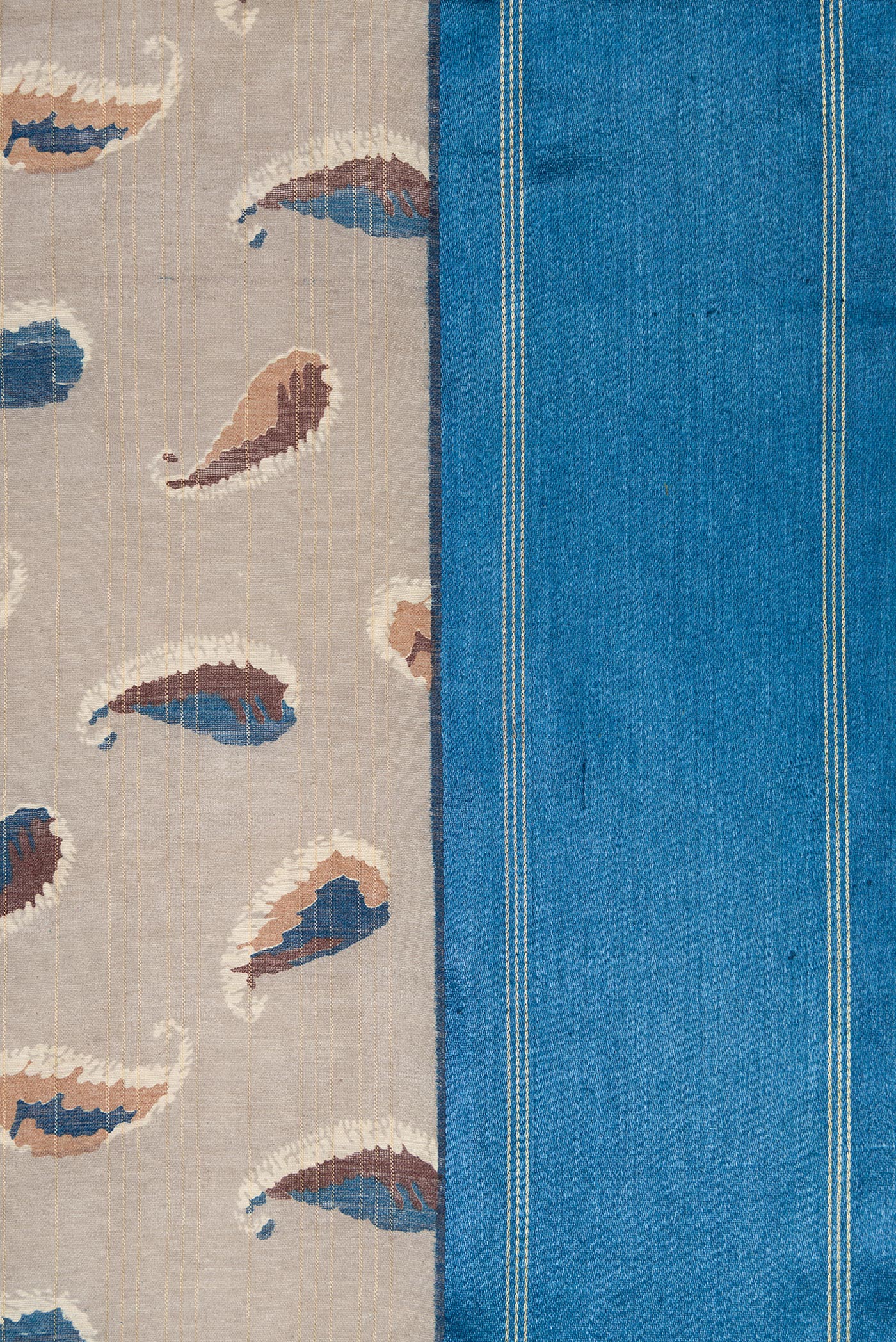 Border image of Grey Dual Tone Tussar Silk Saree with Printed design on the body and Zari Border. 
