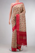 Beige Dual Tone Tussar Silk Saree with Printed design on the body and Zari Border.  displayed on a mannequin