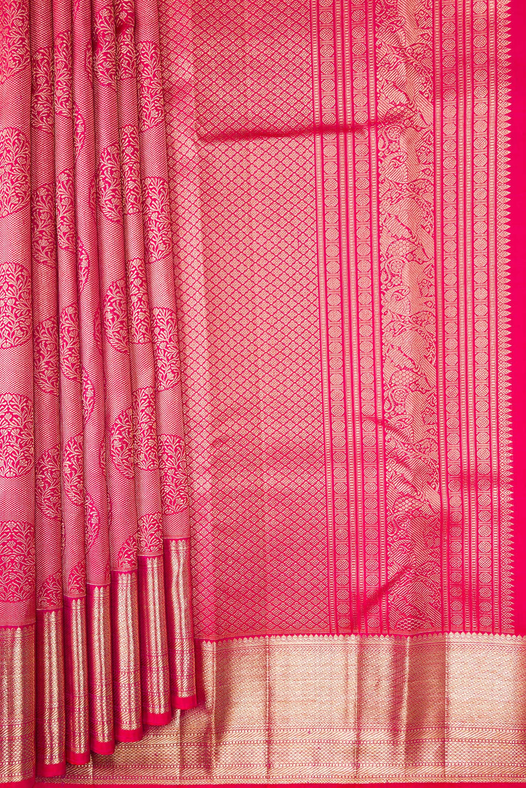 Pleats and pallu of Pink Dual Tone Kanchipuram Silk Saree with Zari Butta on the body and Zari Border. 