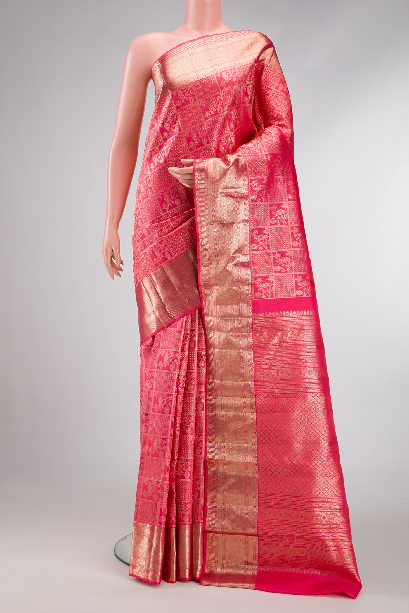 Pink Dual Tone Kanchipuram Silk Saree with Zari Brocade on the body and Zari Border.  displayed on a mannequin