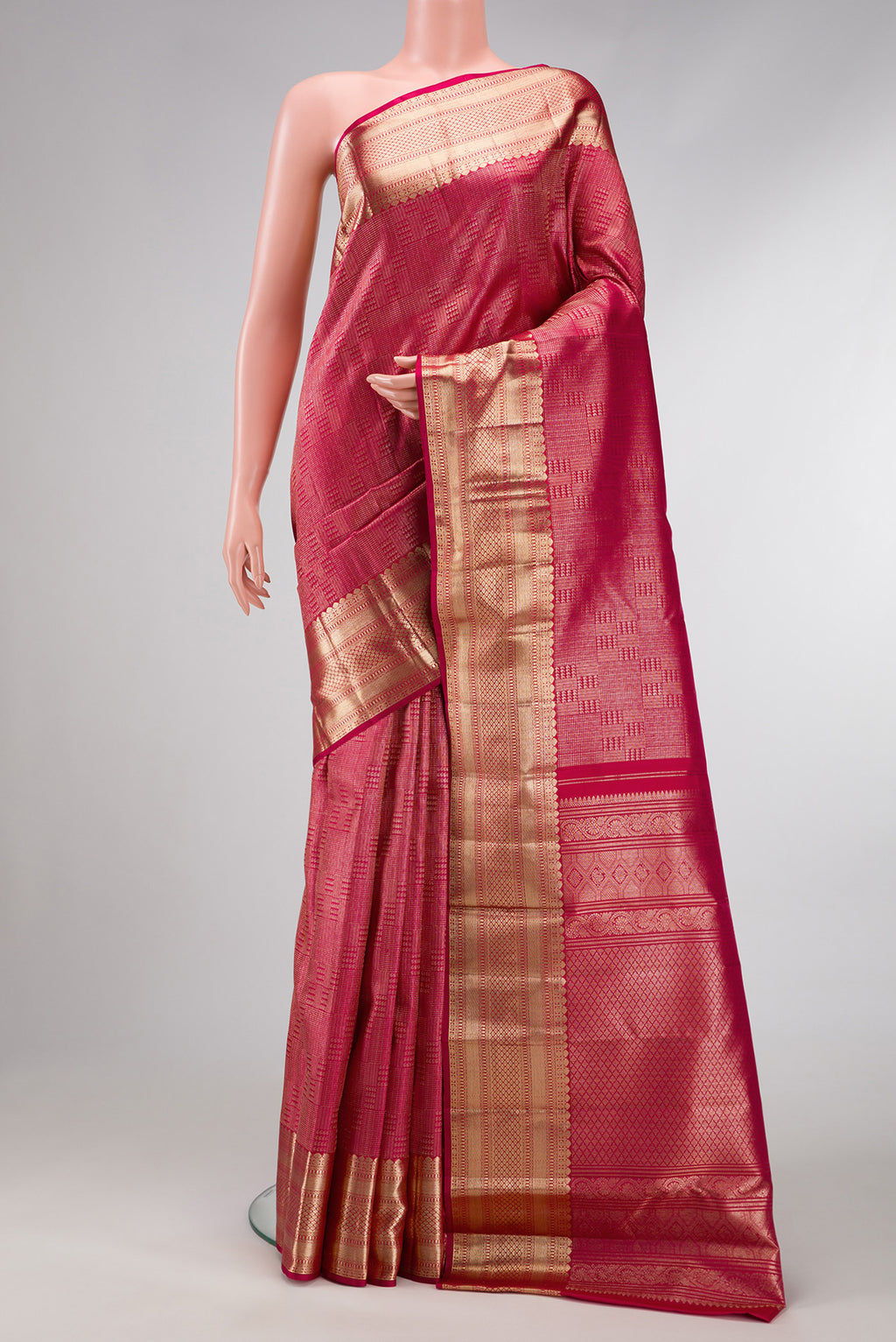 Maroon Dual Tone Kanchipuram Silk Saree with Zari Brocade on the body and Zari Border.  displayed on a mannequin