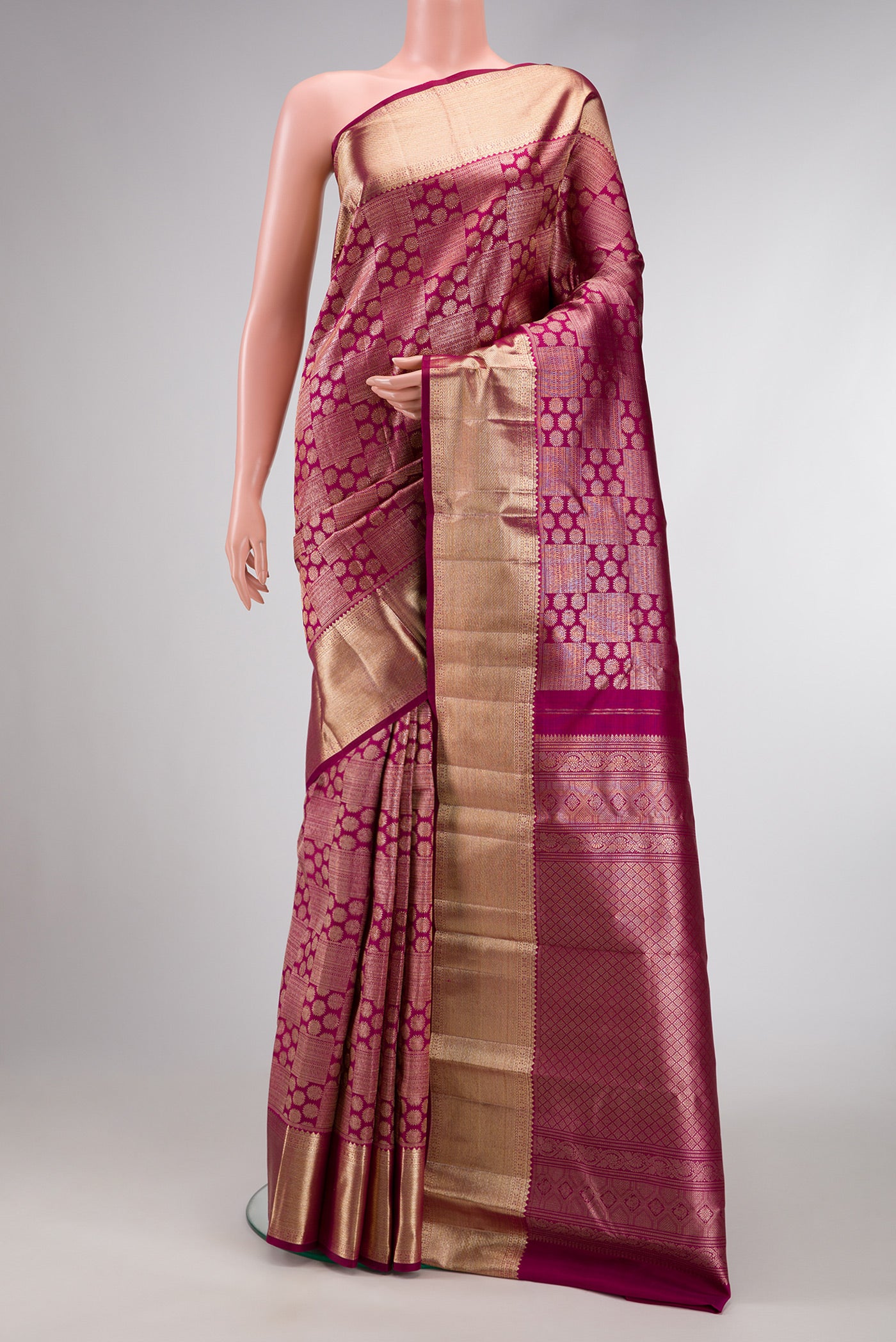 Purple Dual Tone Kanchipuram Silk Saree with Zari Brocade on the body and Zari Border.  displayed on a mannequin