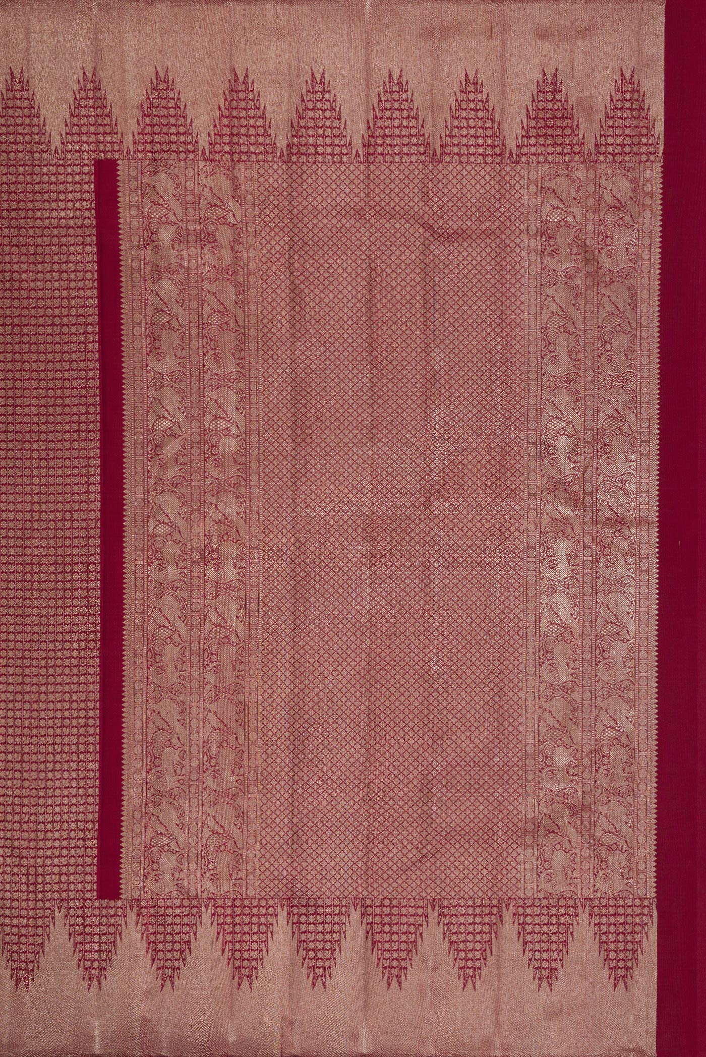 Close up image of the pallu of Maroon Dual Tone Kanchipuram Silk Saree with Zari Brocade on the body and Zari Border. 