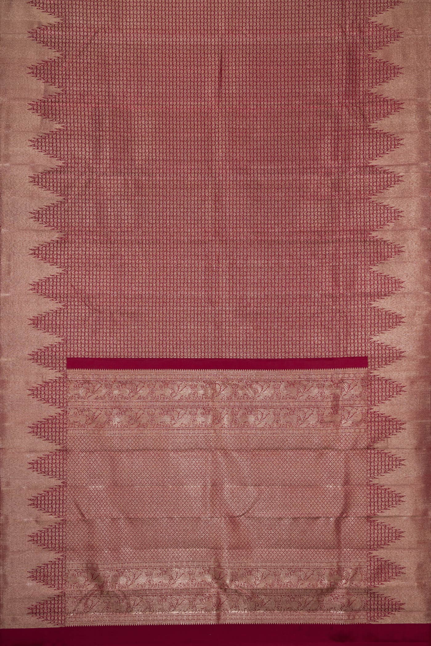 Flat view of Maroon Dual Tone Kanchipuram Silk Saree with Zari Brocade on the body and Zari Border. 