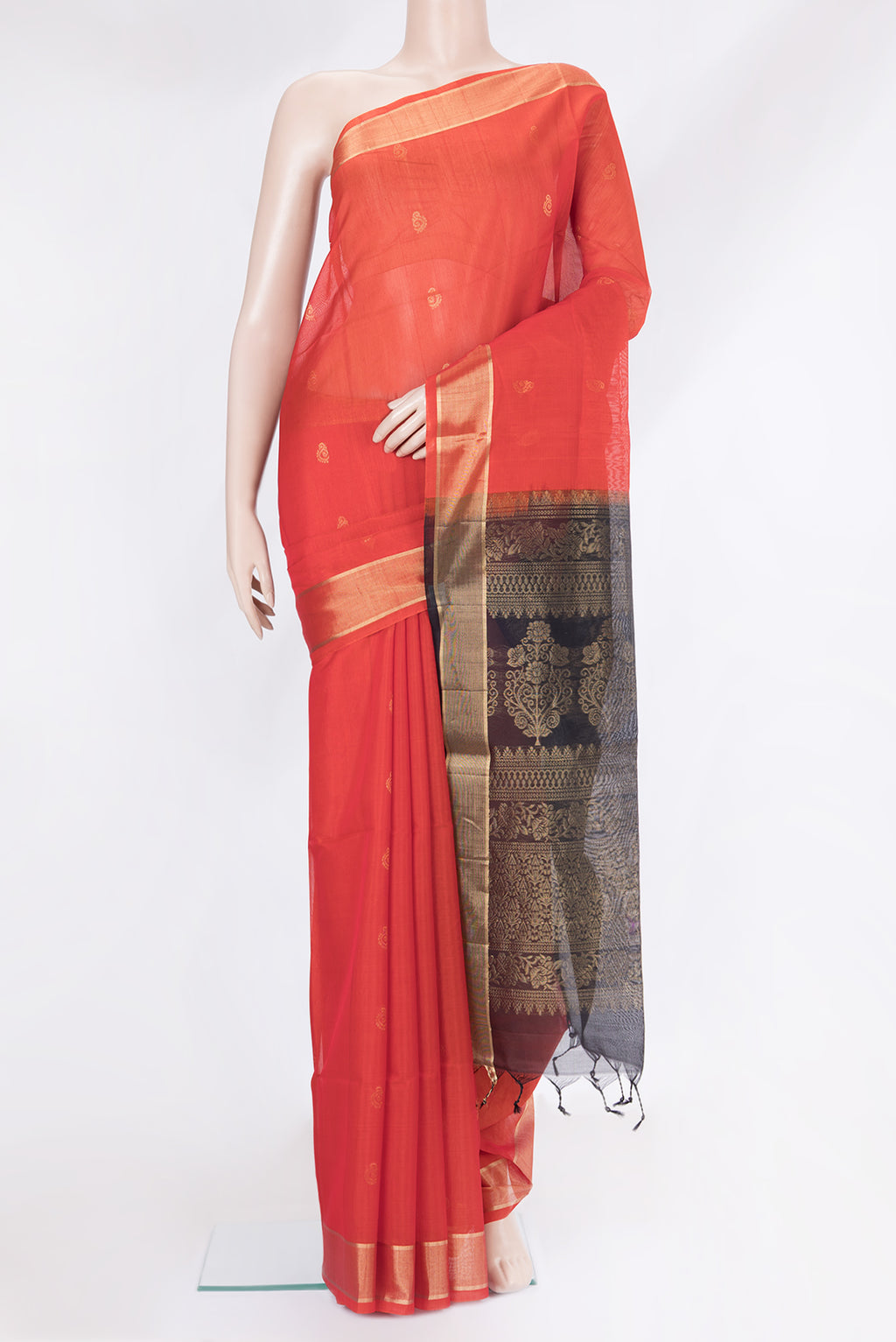 Red Silk Cotton Saree with Zari Butta on the body and Zari Border.  displayed on a mannequin