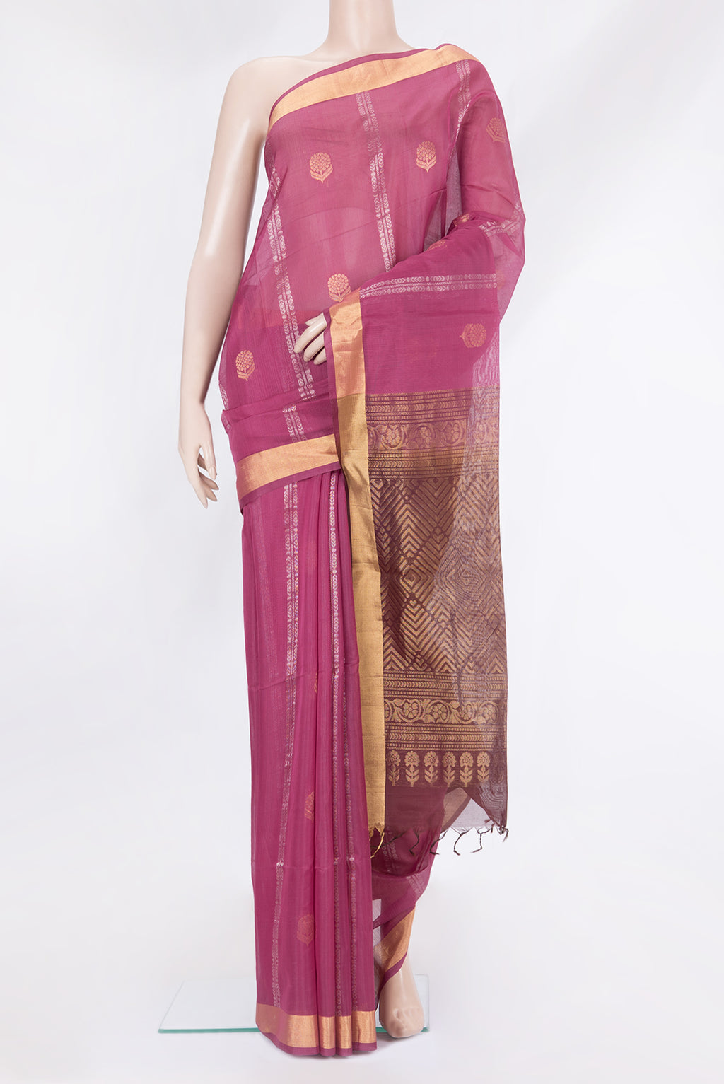 Magenta Silk Cotton Saree with Zari Butta on the body and Zari Border.  displayed on a mannequin