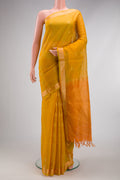 Mustard Silk Cotton Saree with Zari Butta on the body and Zari Border.  displayed on a mannequin