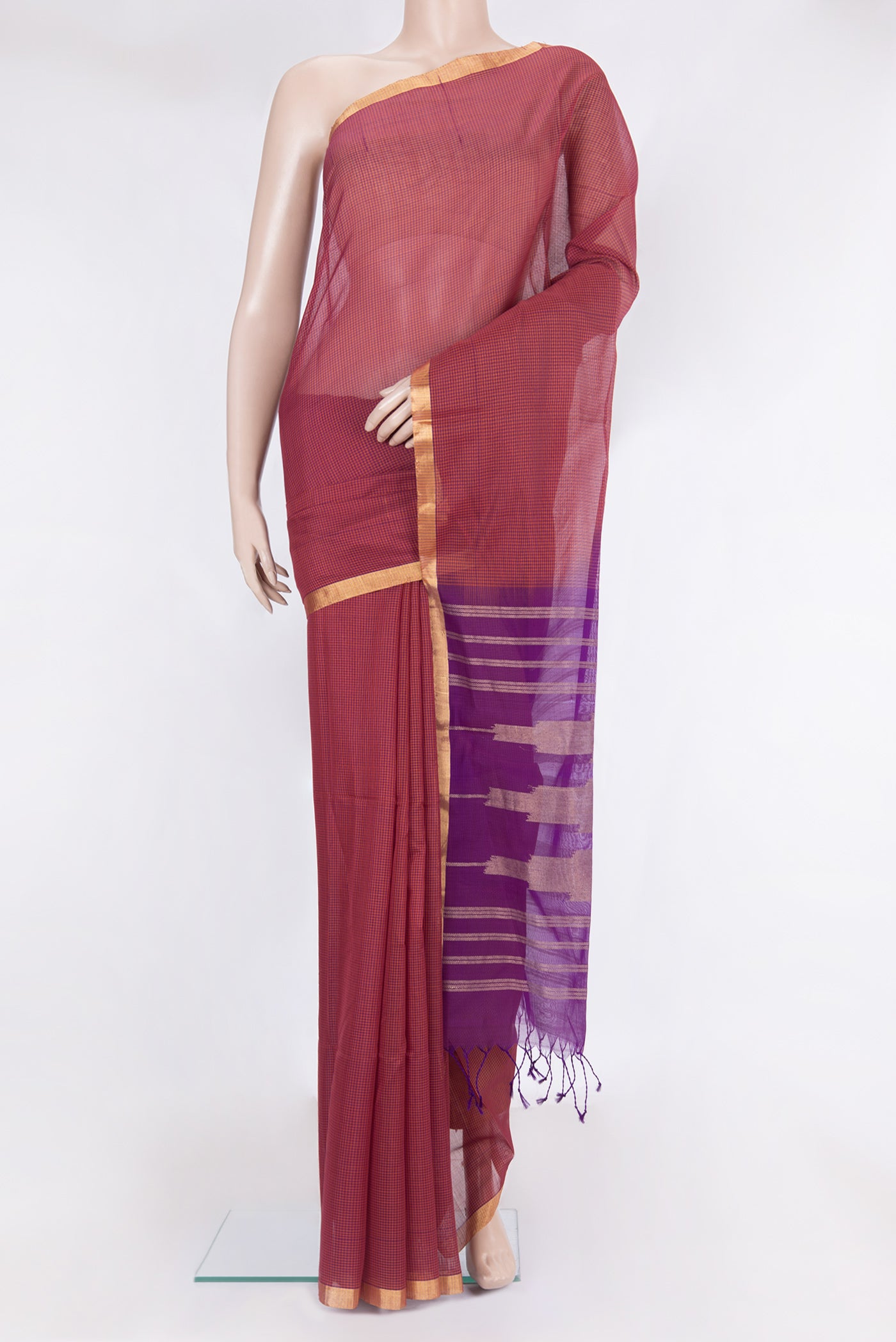 Orange Silk Cotton Saree with Checked design on the body and Zari Border.  displayed on a mannequin