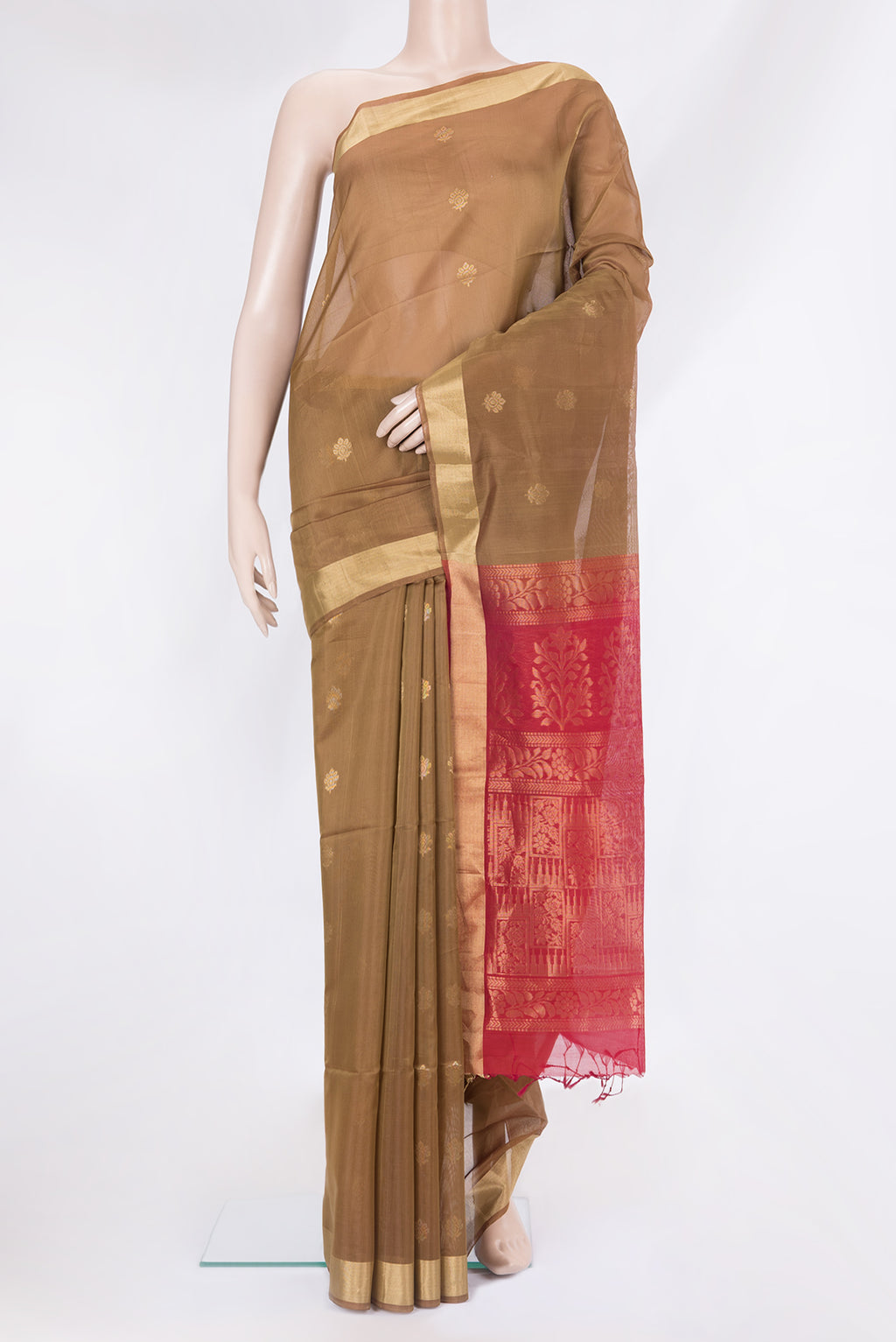 Brown Silk Cotton Saree with Zari Butta on the body and Zari Border.  displayed on a mannequin