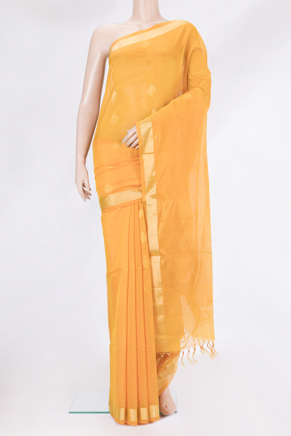 Yellow Silk Cotton Saree with Zari Butta on the body and Zari Border.  displayed on a mannequin