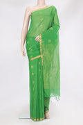 Green Silk Cotton Saree with Zari Butta on the body and Zari Border.  displayed on a mannequin