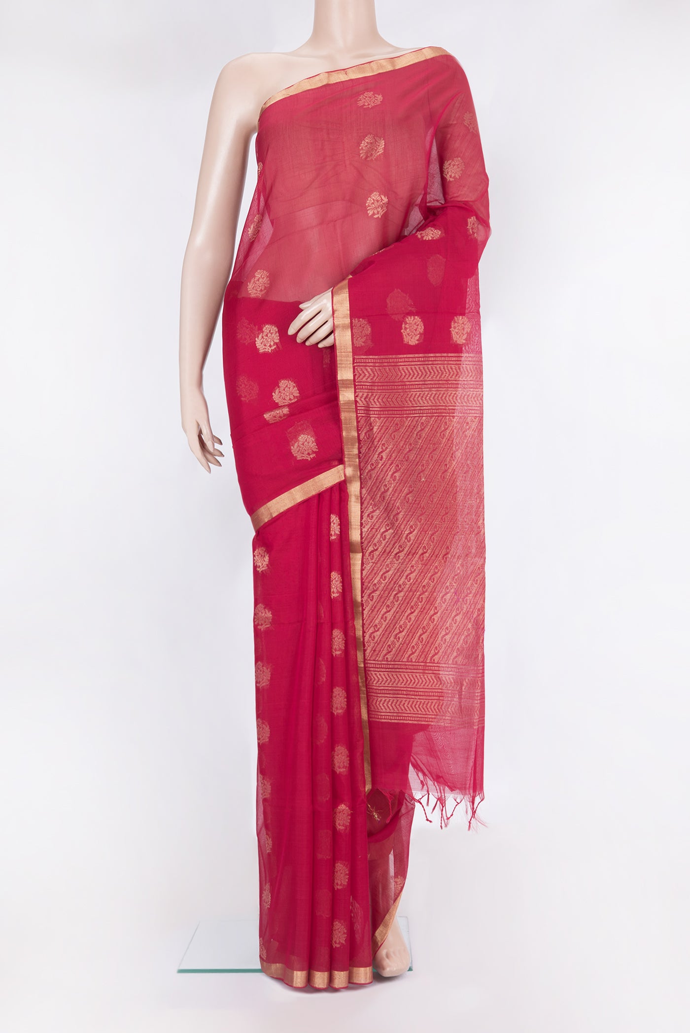 Dark Pink Silk Cotton Saree with Zari Butta on the body and Zari Border.  displayed on a mannequin