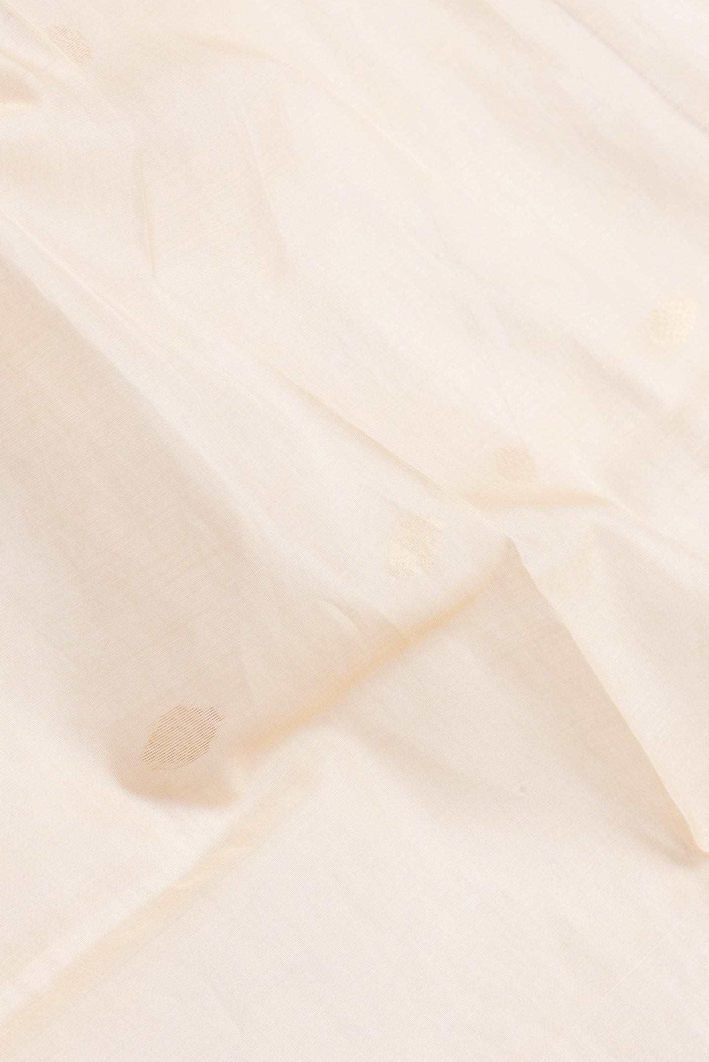 Close up of Sandal Dual Tone Silk Cotton Saree with Zari Butta on the body and Zari Border.  displaying folds