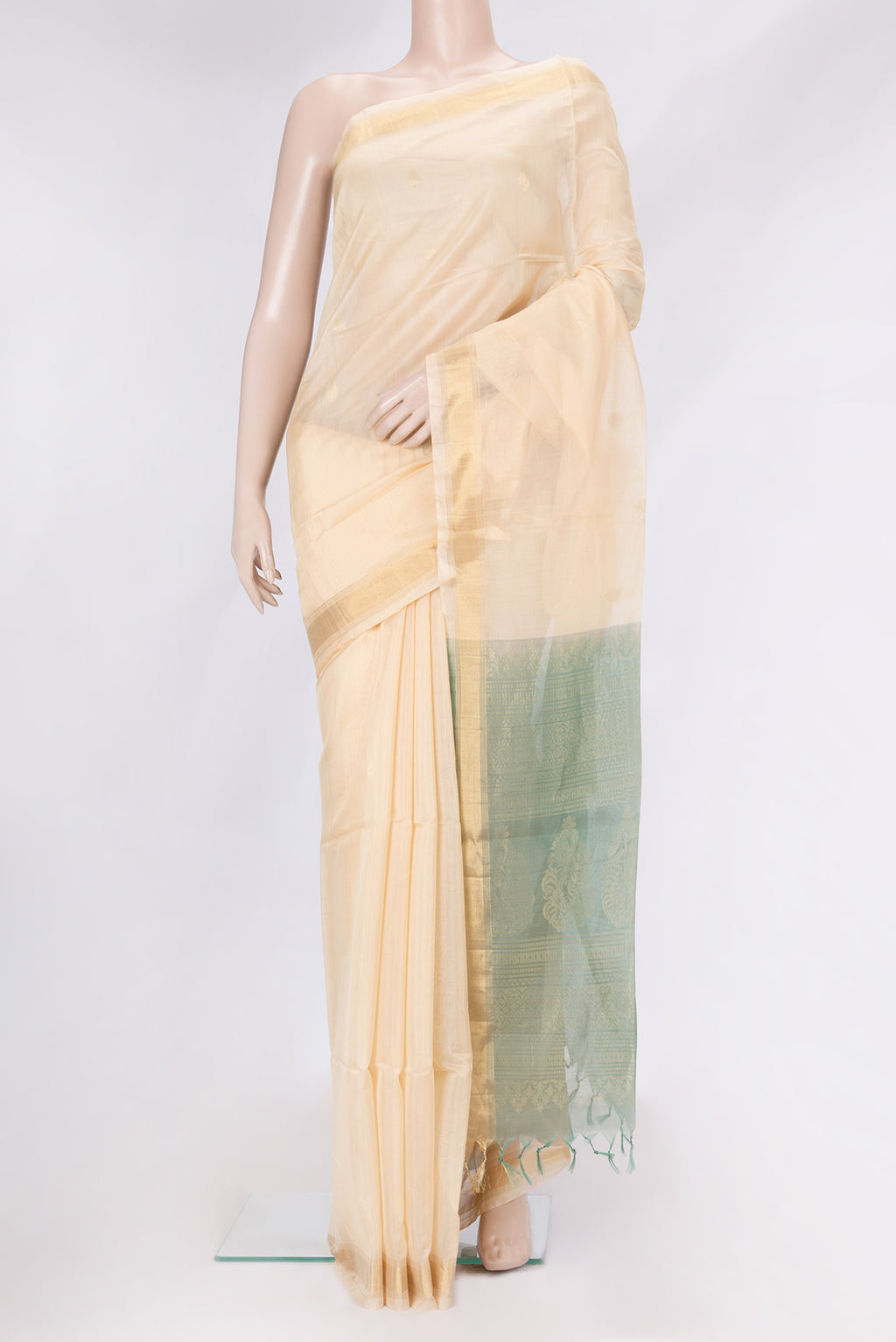 Sandal Dual Tone Silk Cotton Saree with Zari Butta on the body and Zari Border.  displayed on a mannequin