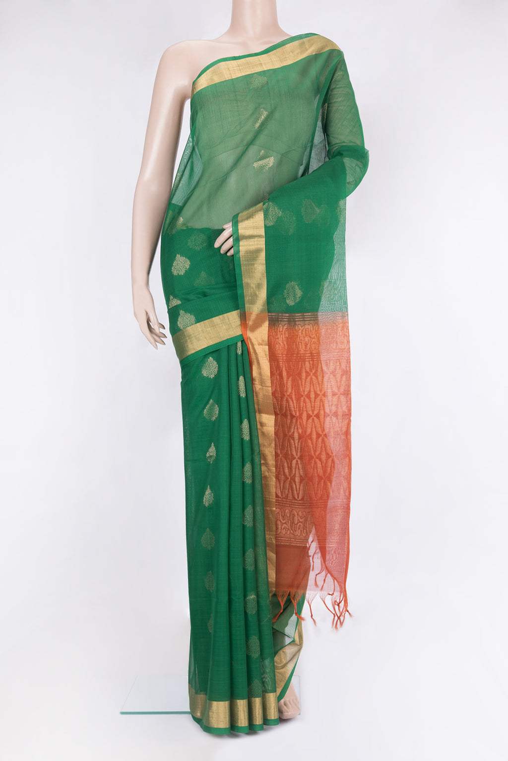 Green Silk Cotton Saree with Zari Butta on the body and Zari Border.  displayed on a mannequin