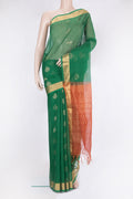 Green Silk Cotton Saree with Zari Butta on the body and Zari Border.  displayed on a mannequin